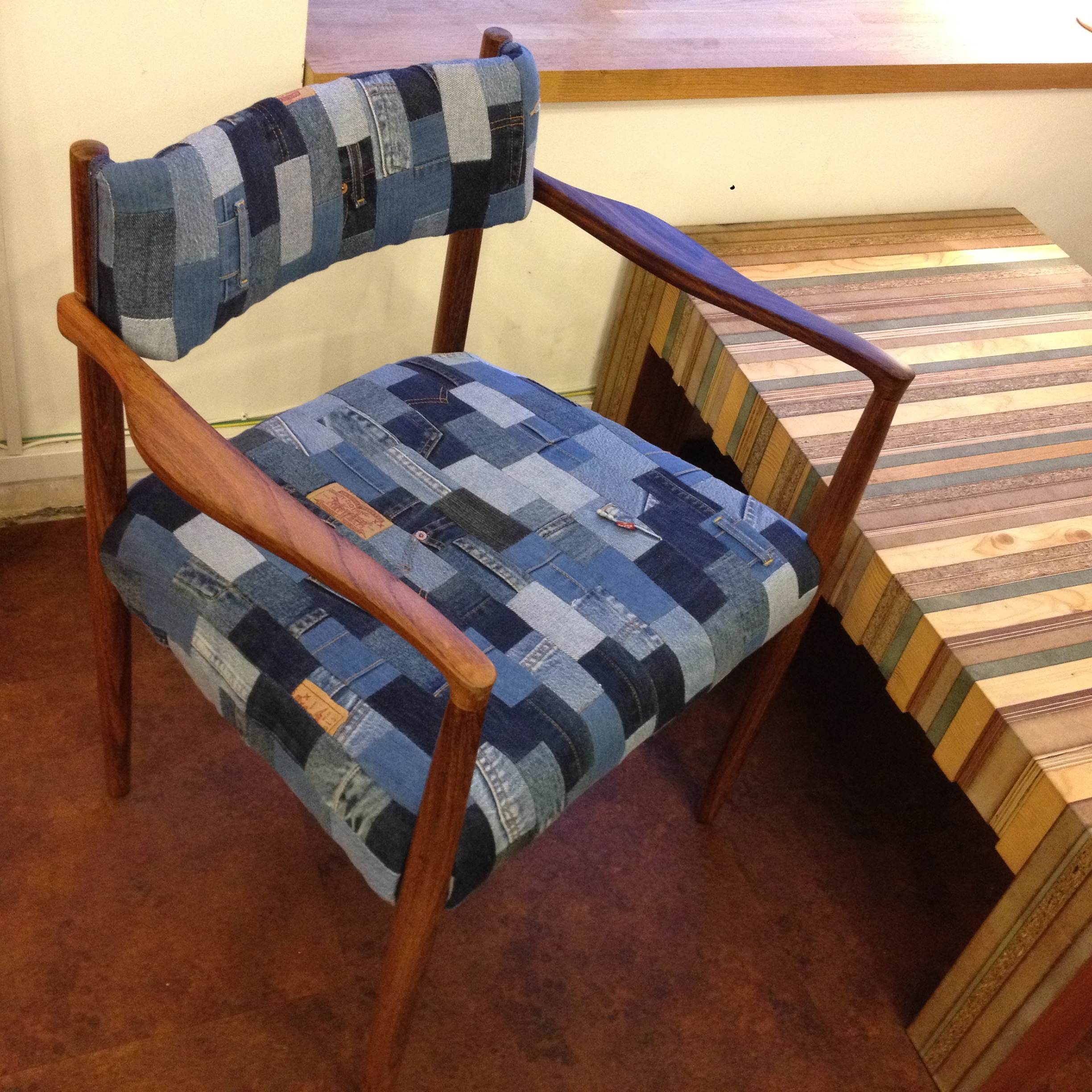 This Chair is upcycled in London using a well built, quality chair using old jeans. The chair is ready for another lifetime. Made by Emma Phelps.