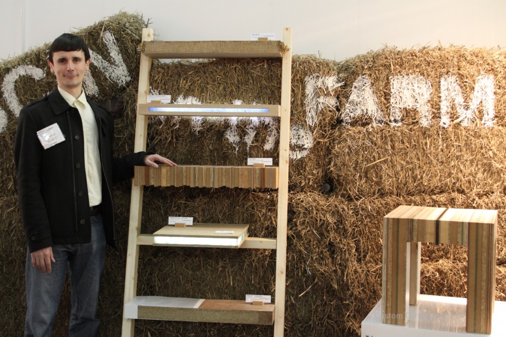 Tristan Titeux standing next to his eco shelves made of sustainable materials